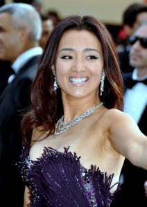 Gong Li. Her IMDB bio lists 30 credits. among them are classics of fifth generation cinema such as Raise the Red Lantern and Red Sorgum.  